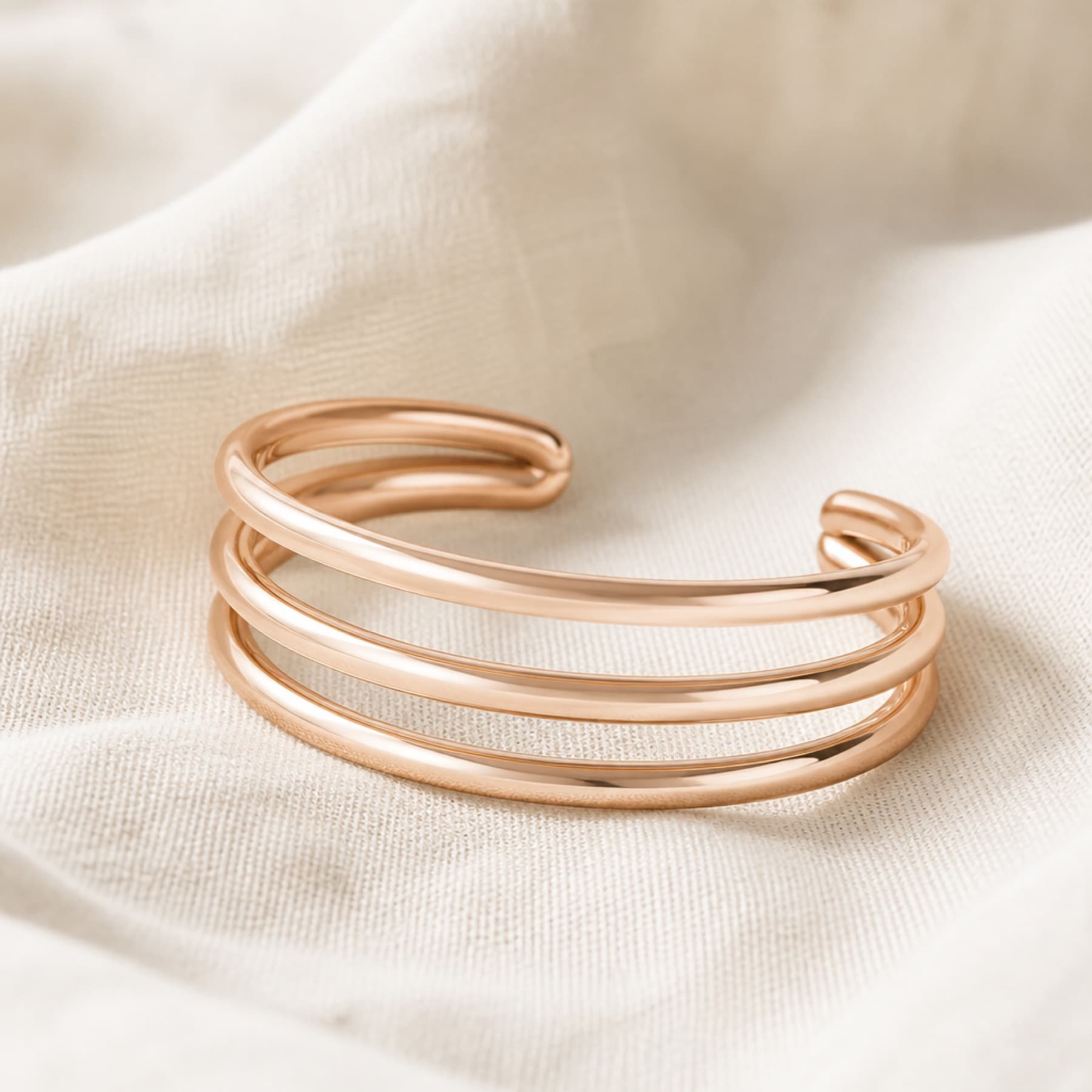 Coil Cuff rose-tone bracelets