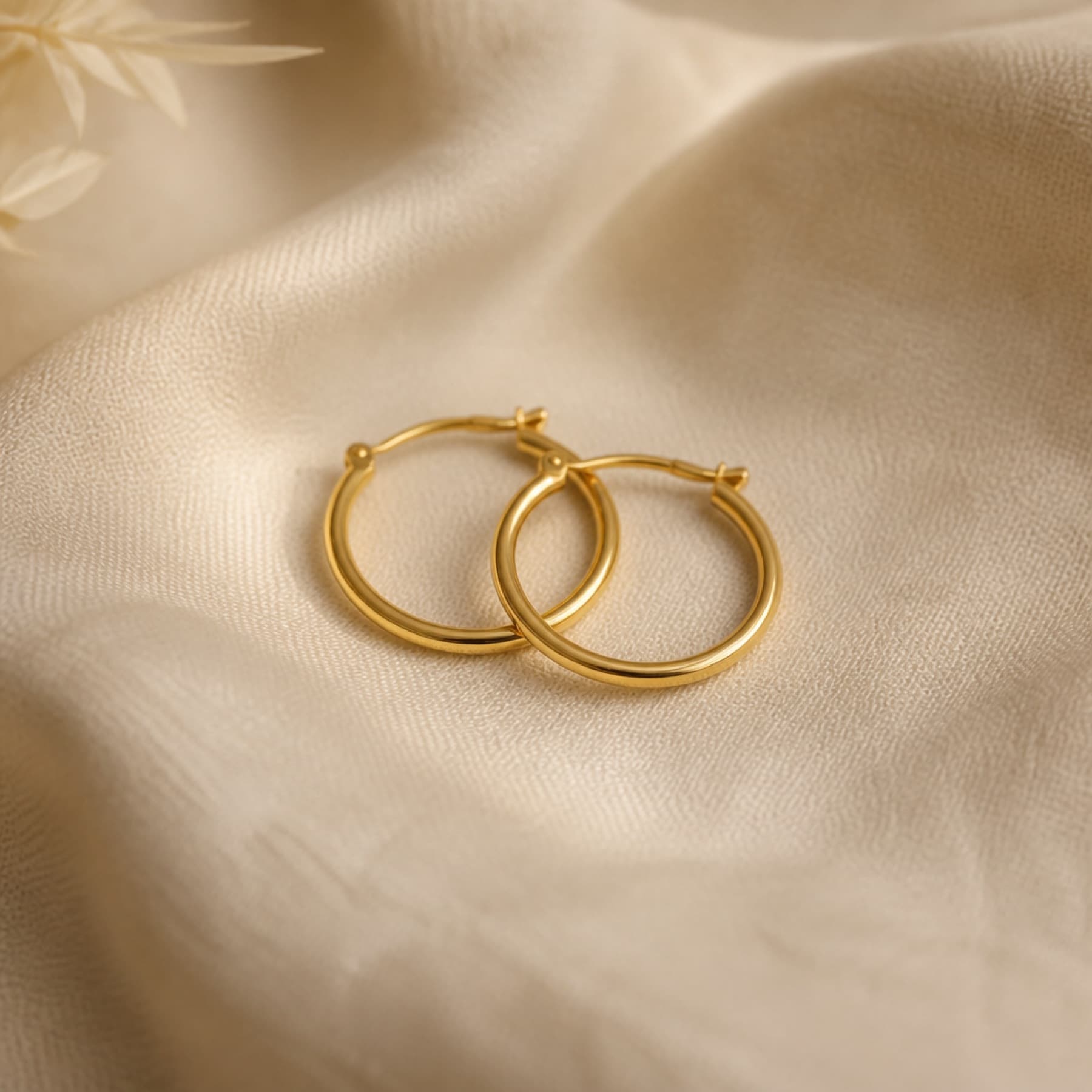 The Quiet Hoop gold-tone earrings