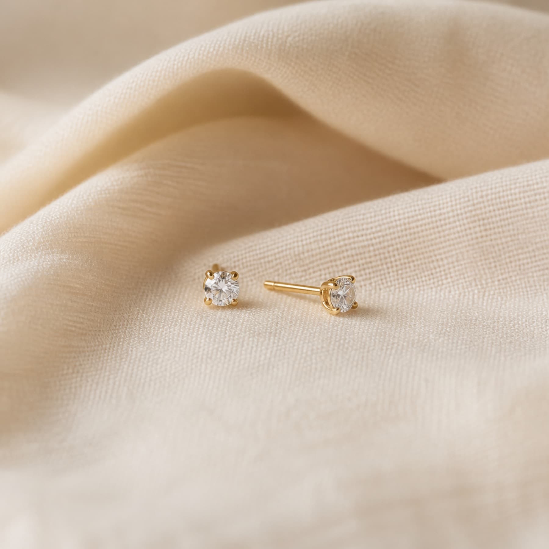 Tiny Spark gold-tone earrings